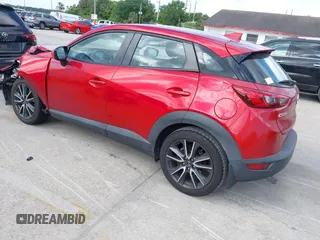 2018 Mazda CX-3 Touring with VIN JM1DKDC7XJ0318219, listed as a IAAI auction lot 41941104 with 86,186 mi miles. Bid and sale history available at carsss.com. Image 3.