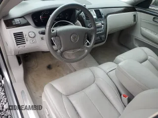 2011 Cadillac DTS Professional Limousine z VIN 1GE7K9C66BU600196, wystawiony jako Copart lot #75916064 z przebiegiem 37 183 mil mil oraz Tytuł czysty. Historia ofert i sprzedaży dostępna na DreamBid. Obrazek 7.