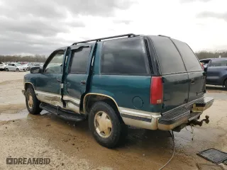 1997 Chevrolet Tahoe with VIN 1GNEK13R2VJ318355, listed as a Copart auction lot 89341095 with 303,882 mi miles and Salvage Title. Bid and sale history available at carsss.com. Image 2.