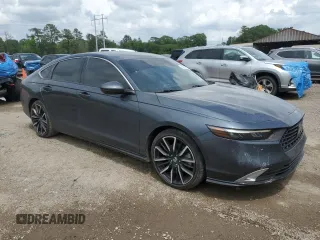 2023 Honda Accord Touring with VIN 1HGCY2F84PA028341, listed as a Copart auction lot 54060315 with 55,296 mi miles and Salvage title. Bid and sale history available at DreamBid. Image 4.