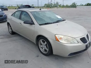 2009 Pontiac G6 w/1SA *Ltd Avail* with VIN 1G2ZG57N394223449, listed as a IAAI auction lot 42070388 with 75,089 mi miles. Bid and sale history available at carsss.com. Image 1.