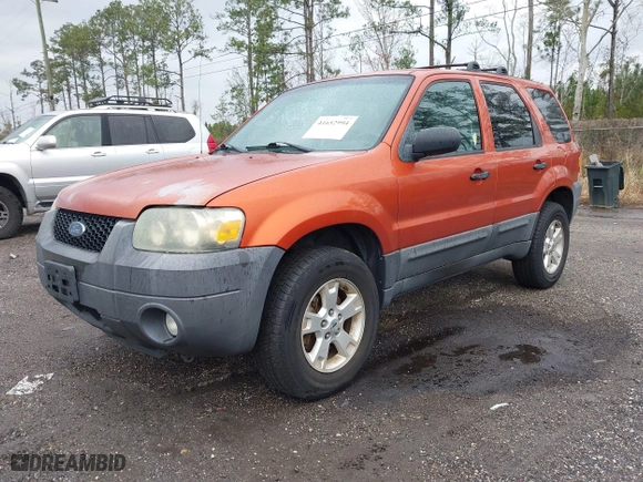 2007 Ford Escape XLT with VIN 1FMYU93177KA38867, listed as a IAAI auction lot 41652994 with 136,730 mi miles. Bid and sale history available at carsss.com. Image 2.
