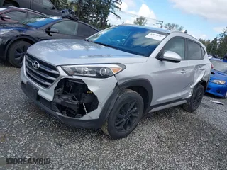 2017 Hyundai Tucson SE Plus with VIN KM8J33A40HU449337, listed as a IAAI auction lot 42010707 with 55,383 mi miles. Bid and sale history available at carsss.com. Image 2.