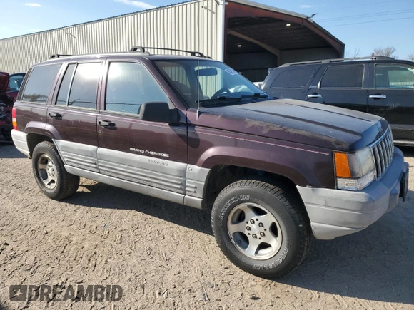 1998 Jeep Grand Cherokee Laredo with VIN 1J4FX58SXWC144715, listed as a Copart auction lot 86423594 with 93,936 mi miles and Clean Title. Bid and sale history available at carsss.com. Image 4.