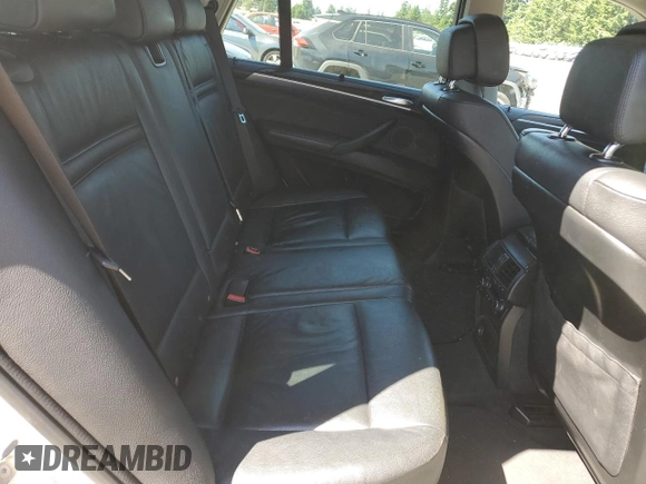 2012 BMW X5 35i with VIN 5UXZV4C5XCL987618, listed as a Copart auction lot 60308965 with 98,195 mi miles and Salvage title. Bid and sale history available at DreamBid. Image 11.