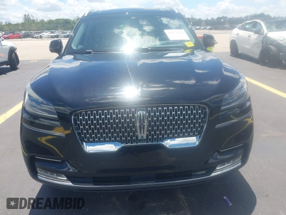 2021 Lincoln Aviator Reserve with VIN 5LM5J7WC0MGL12385, listed as a IAAI auction lot 42472422 with 20,404 mi miles and . Bid and sale history available at DreamBid. Image 6.