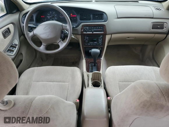 1998 Nissan Altima XE z VIN 1N4DL01D4WC217607, wystawiony jako Copart lot #55434615 z przebiegiem 182 205 mil mil oraz Szkoda całkowita • Salvage title. Historia ofert i sprzedaży dostępna na DreamBid. Obrazek 8.