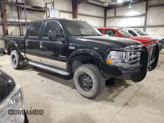 2001 Ford F-350 with VIN 1A040185, listed as a Copart auction lot 87953295 with 212,487 mi miles and Salvage title. Bid and sale history available at DreamBid. Image 4.