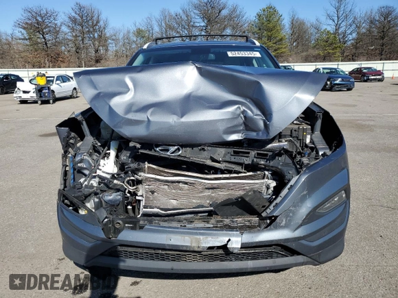 2017 Hyundai Tucson SE z VIN KM8J33A44HU376246, wystawiony jako Copart lot #52453345 z przebiegiem 97 306 mil mil oraz Szkoda całkowita • Salvage title. Historia ofert i sprzedaży dostępna na DreamBid. Obrazek 5.
