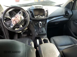2015 Ford Escape Titanium with VIN 1FMCU0J96FUC59510, listed as a Copart auction lot 57091765 with 120,586 mi miles and Salvage title. Bid and sale history available at DreamBid. Image 8.
