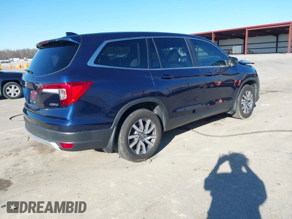2021 Honda Pilot EX-L with VIN 5FNYF6H5XMB019425, listed as a IAAI auction lot 41698961 with 63,325 mi miles and . Bid and sale history available at carsss.com. Image 4.