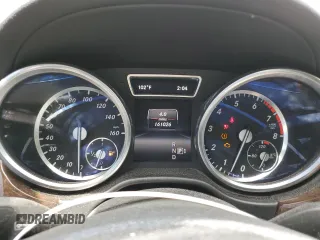 2014 Mercedes-Benz GL 450 z VIN 4JGDF7CE4EA314084, wystawiony jako Copart lot #59593195 z przebiegiem 161 026 mil mil oraz Szkoda całkowita • Salvage title. Historia ofert i sprzedaży dostępna na DreamBid. Obrazek 9.