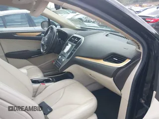 2016 Lincoln MKC Select with VIN 5LMCJ2D97GUJ26611, listed as a IAAI auction lot 42462595 with Not provided miles and . Bid and sale history available at DreamBid. Image 5.