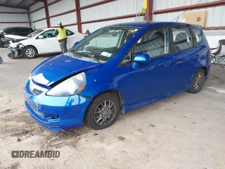 2007 Honda Fit Sport z VIN JHMGD38667S014334, wystawiony jako IAAI lot #42349784 z przebiegiem 176 274 mil mil oraz . Historia ofert i sprzedaży dostępna na DreamBid. Obrazek 2.