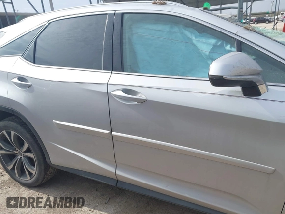 2019 Lexus RX with VIN 2T2ZZMCA3KC135292, listed as a IAAI auction lot 41573153 with 106,971 mi miles. Bid and sale history available at carsss.com. Image 13.