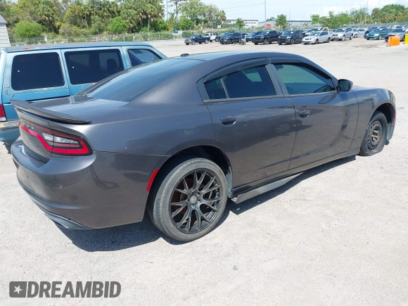 2015 Dodge Charger SE z VIN 2C3CDXBGXFH751491, wystawiony jako IAAI lot #41907243 z przebiegiem 112 545 mil mil oraz . Historia ofert i sprzedaży dostępna na DreamBid. Obrazek 4.
