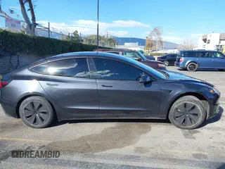 2024 Tesla Model 3 with VIN 5YJ3E1EA0RF718703, listed as a IAAI auction lot 41278243 with 6,504 mi miles. Bid and sale history available at carsss.com. Image 13.