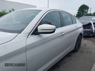 2018 BMW 5 Series 530i xDrive with VIN WBAJA7C5XJG907944, listed as a IAAI auction lot 42290336 with 111,512 mi miles and . Bid and sale history available at DreamBid. Image 14.