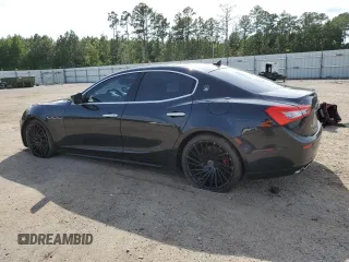 2015 Maserati Ghibli S Q4 with VIN ZAM57RTA1F1143547, listed as a Copart auction lot 63608573 with 84,917 mi miles. Bid and sale history available at carsss.com. Image 2.