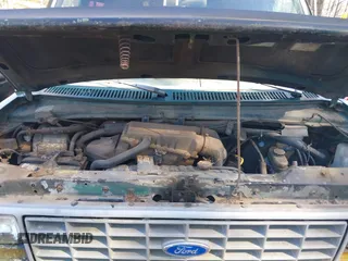 1990 Ford Econoline Cargo with VIN 1FTES14YXLHA99552, listed as a IAAI auction lot 41820558 with 178,000 mi miles and . Bid and sale history available at DreamBid. Image 10.