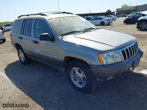 2001 Jeep Grand Cherokee Laredo with VIN 1J4GW48S61C662315, listed as a IAAI auction lot 42002235 with 166,901 mi miles. Bid and sale history available at carsss.com. Image 1.