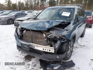 2018 Honda Pilot EX-L with VIN 5FNYF6H57JB007065, listed as a IAAI auction lot 41418432 with 123,806 mi miles. Bid and sale history available at carsss.com. Image 6.