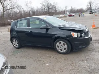 2014 Chevrolet Sonic LS with VIN 1G1JA6SH6E4139131, listed as a IAAI auction lot 41727625 with 97,241 mi miles and . Bid and sale history available at DreamBid. Image 13.