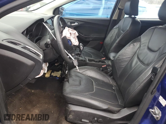 2015 Ford Focus Titanium z VIN 1FADP3J20FL299209, wystawiony jako Copart lot #67681504 z przebiegiem 98 711 mil mil oraz Nie do naprawy • Non repairable. Historia ofert i sprzedaży dostępna na DreamBid. Obrazek 7.