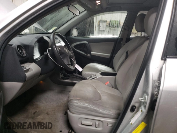 2009 Toyota RAV4 with VIN 2T3ZF31VX9W011727, listed as a Copart auction lot 87837365 with 106,622 mi miles and Salvage title. Bid and sale history available at DreamBid. Image 7.