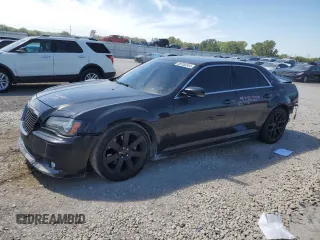 2013 Chrysler 300 SRT-8 with VIN 2C3CCAFJ9DH731557, listed as a Copart auction lot 69700344 with 174,242 mi miles and Salvage Title. Bid and sale history available at carsss.com. Image 1.
