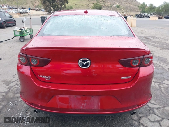 2021 Mazda 3 with VIN JM1BPBDL6M1305765, listed as a IAAI auction lot 42063684 with 61,011 mi miles and . Bid and sale history available at DreamBid. Image 16.