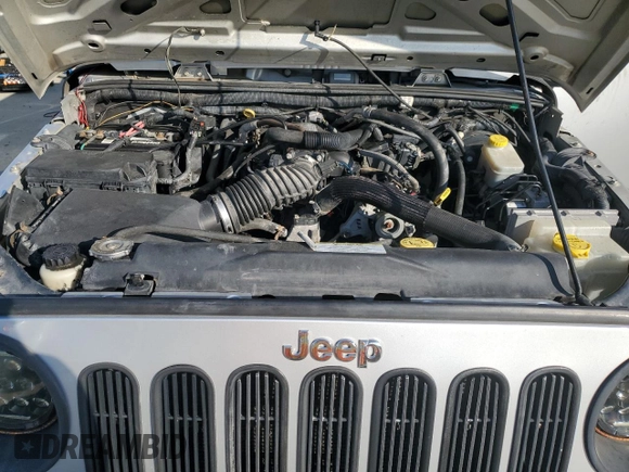 2009 Jeep Wrangler X with VIN 1J4FA24119L729880, listed as a Copart auction lot 54576155 with 173,959 mi miles and Clean Title. Bid and sale history available at DreamBid. Image 12.