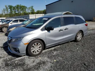 2019 Honda Odyssey LX with VIN 5FNRL6H28KB023506, listed as a Copart auction lot 51911655 with 248,806 mi miles and Salvage Title. Bid and sale history available at DreamBid. Image 1.
