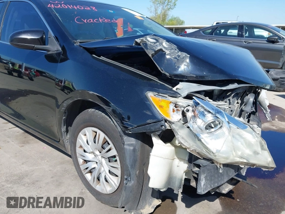 2013 Toyota Camry L with VIN 4T4BF1FK1DR308848, listed as a IAAI auction lot 42014028 with 192,645 mi miles. Bid and sale history available at carsss.com. Image 6.