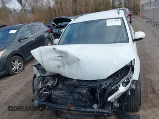 2015 Volkswagen Tiguan SE z VIN WVGBV7AX8FW582171, wystawiony jako IAAI lot #41442290 z przebiegiem 127 642 mil mil oraz . Historia ofert i sprzedaży dostępna na DreamBid. Obrazek 11.