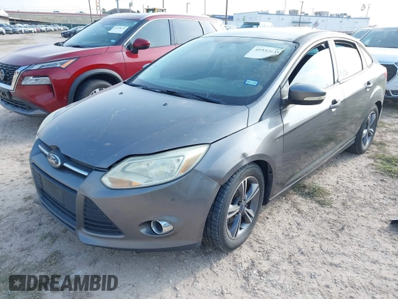 2014 Ford Focus SE with VIN 1FADP3F24EL320991, listed as a IAAI auction lot 41932638 with 133,163 mi miles. Bid and sale history available at carsss.com. Image 2.