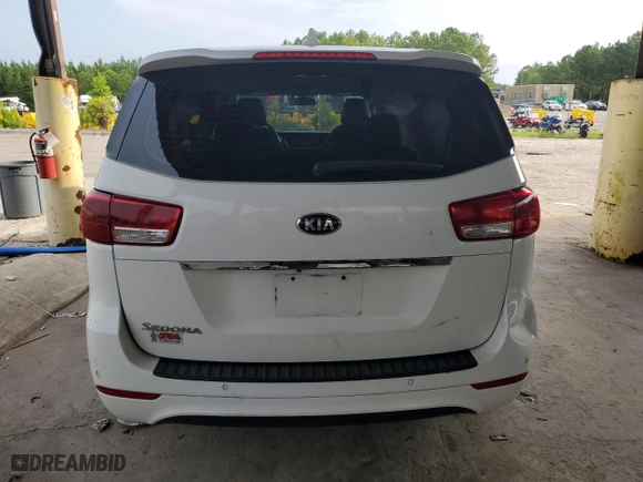 2015 Kia Sedona L with VIN KNDMA5C1XF6016437, listed as a Copart auction lot 64709164 with 173,094 mi miles and Salvage Title. Bid and sale history available at carsss.com. Image 6.