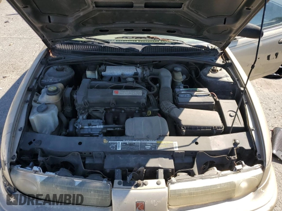 1999 Saturn SL с VIN 1G8ZK527XXZ111390, выставлен на аукционе Copart как лот 49042185 с пробегом 164 733 миль миль и Списание • Salvage title. История ставок и продаж доступна на DreamBid. Изображение 11.