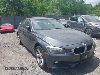 2014 BMW 3 Series 320i xDrive with VIN WBA3C3C57EP662795, listed as a IAAI auction lot 42267683 with 153,451 mi miles and . Bid and sale history available at DreamBid. Image 6.