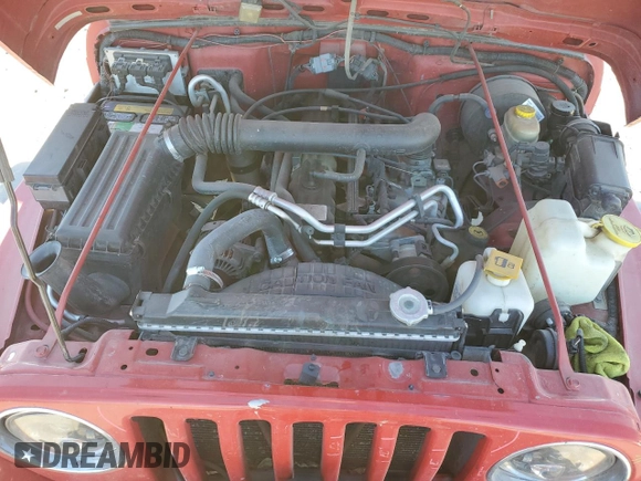 2000 Jeep Wrangler Sport with VIN 1J4FA49S1YP703560, listed as a Copart auction lot 73647844 with 117,300 mi miles and Salvage Title. Bid and sale history available at carsss.com. Image 11.