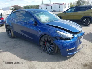 2021 Tesla Model Y Performance z VIN 5YJYGDEF4MF230487, wystawiony jako IAAI lot #42047020 z przebiegiem 70 539 mil mil oraz . Historia ofert i sprzedaży dostępna na DreamBid. Obrazek 1.
