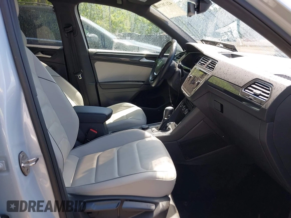 2019 Volkswagen Tiguan SEL Premium with VIN 3VV4B7AXXKM019995, listed as a IAAI auction lot 42170731 with 53,916 mi miles and . Bid and sale history available at DreamBid. Image 5.