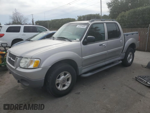 2003 Ford Explorer Sport Trac XLS with VIN 1FMZU67E33UA26245, listed as a Copart auction lot 47224405 with 113,009 mi miles and Salvage title. Bid and sale history available at DreamBid. Image 1.