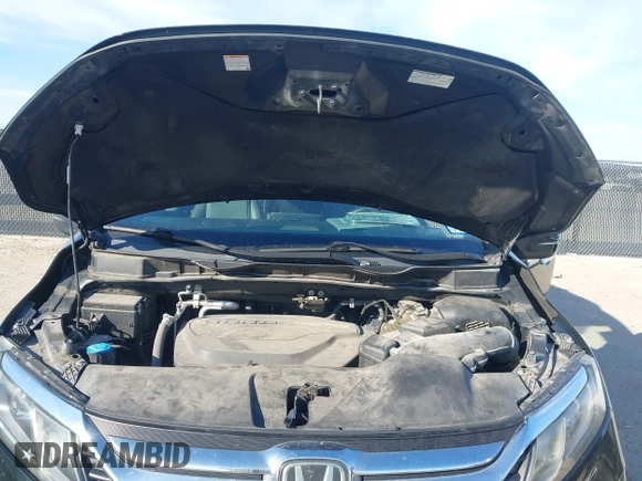 2018 Honda Odyssey EX-L z VIN 5FNRL6H74JB031306, wystawiony jako IAAI lot #41603478 z przebiegiem Nie podano mil oraz . Historia ofert i sprzedaży dostępna na DreamBid. Obrazek 10.
