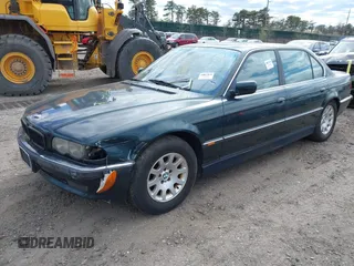 2000 BMW 7 Series 740iL with VIN WBAGH8343YDP13075, listed as a IAAI auction lot 42050589 with 999,999 mi miles. Bid and sale history available at carsss.com. Image 2.