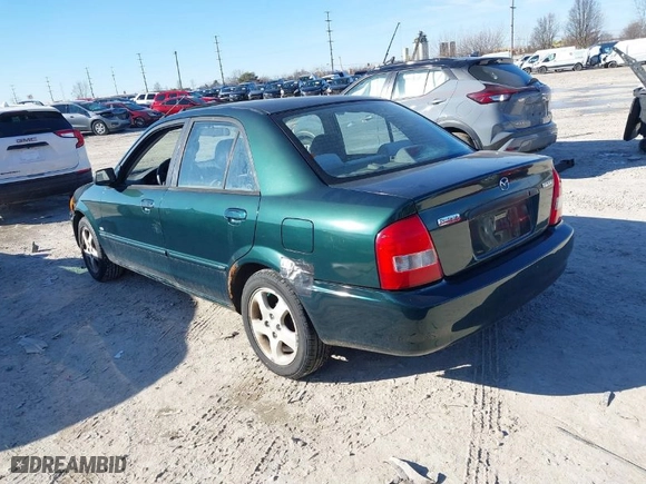 2000 Mazda Protege ES with VIN JM1BJ2211Y0285066, listed as a IAAI auction lot 41581940 with 133,630 mi miles. Bid and sale history available at carsss.com. Image 3.