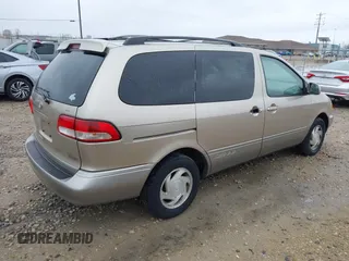 2003 Toyota Sienna LE with VIN 4T3ZF13C13U522248, listed as a IAAI auction lot 42070178 with 228,695 mi miles. Bid and sale history available at carsss.com. Image 4.