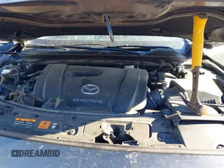 2022 Mazda 3 Carbon Edition z VIN 3MZBPACL4NM309701, wystawiony jako IAAI lot #41419875 z przebiegiem 23 819 mil mil oraz . Historia ofert i sprzedaży dostępna na DreamBid. Obrazek 10.