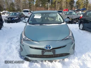 2016 Toyota Prius Two with VIN JTDKBRFU4G3017233, listed as a IAAI auction lot 41520005 with 95,501 mi miles and . Bid and sale history available at DreamBid. Image 12.