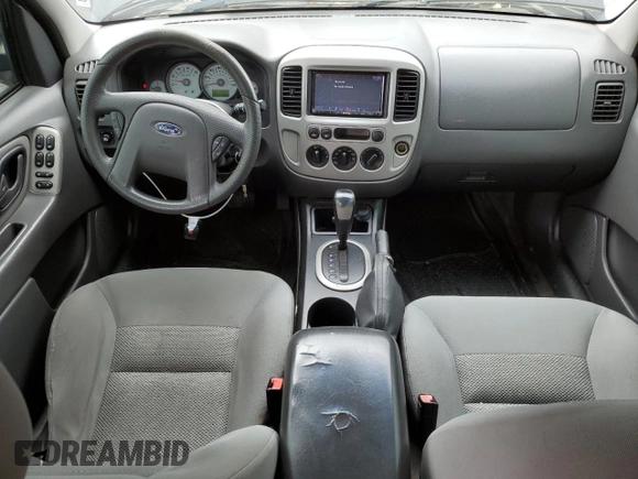 2005 Ford Escape XLT with VIN 1FMYU03165KB36801, listed as a Copart auction lot 61978705 with 217,658 mi miles and Salvage title. Bid and sale history available at DreamBid. Image 8.
